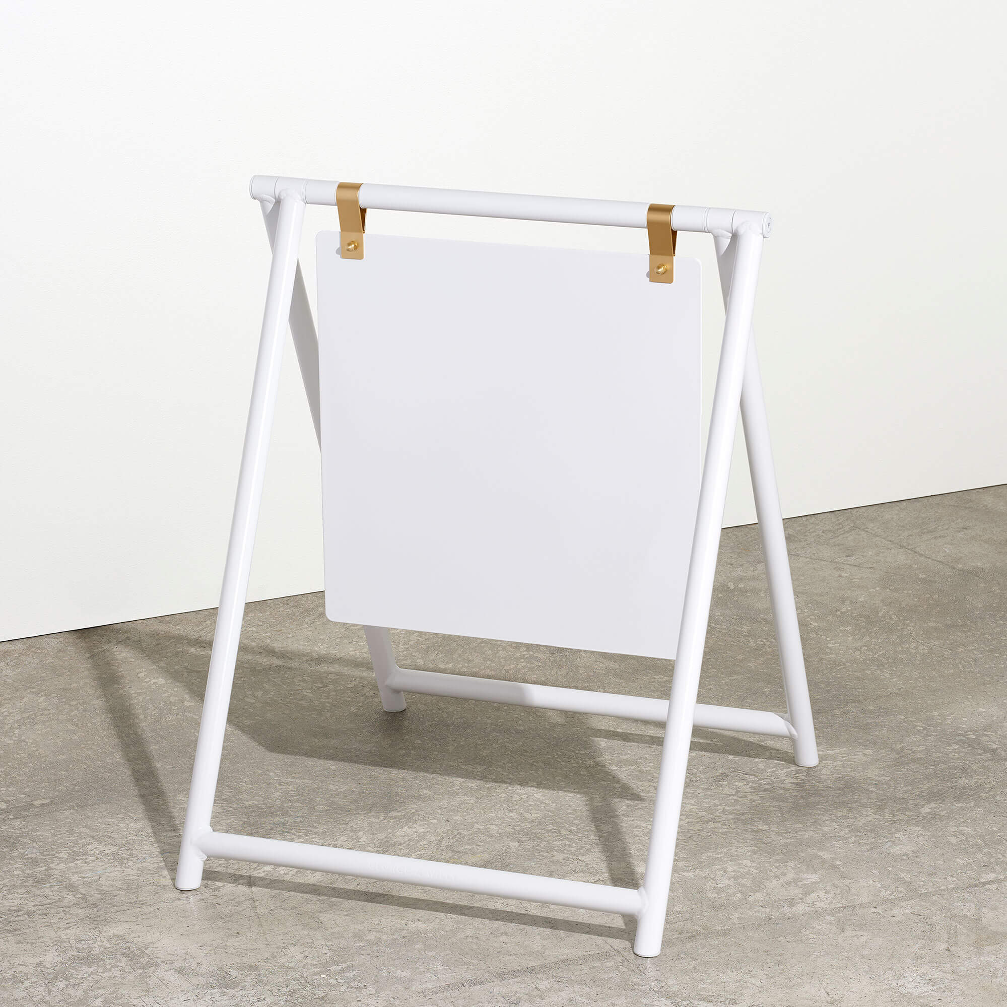 White blank A Frame sidewalk business sign with interchangeable board, studio background