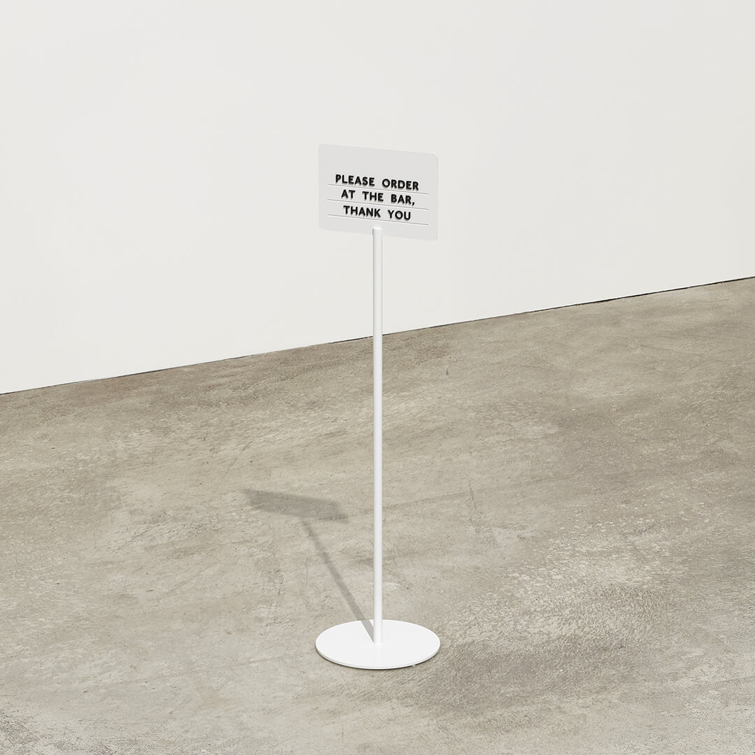 white standing rectangle sign in the studio