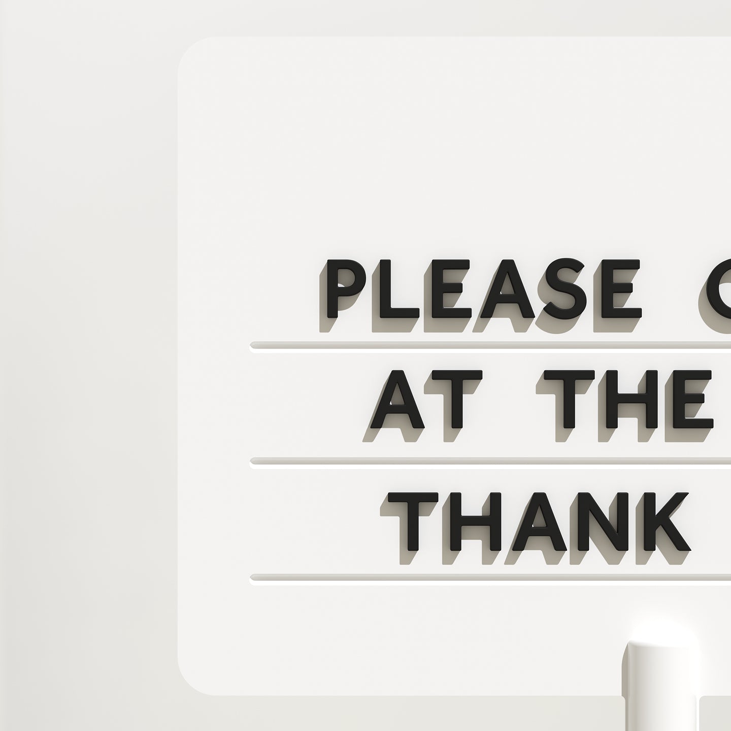 close up of magnet letters on a white standing rectangle sign