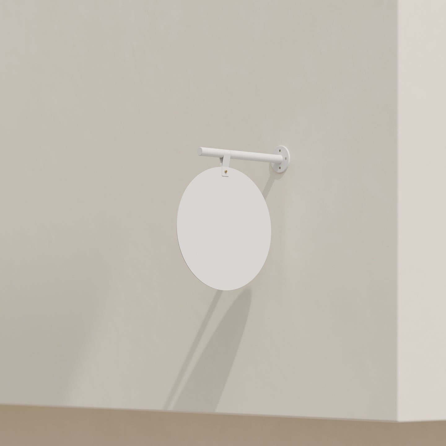 plain white blade round sign hanging on a wall