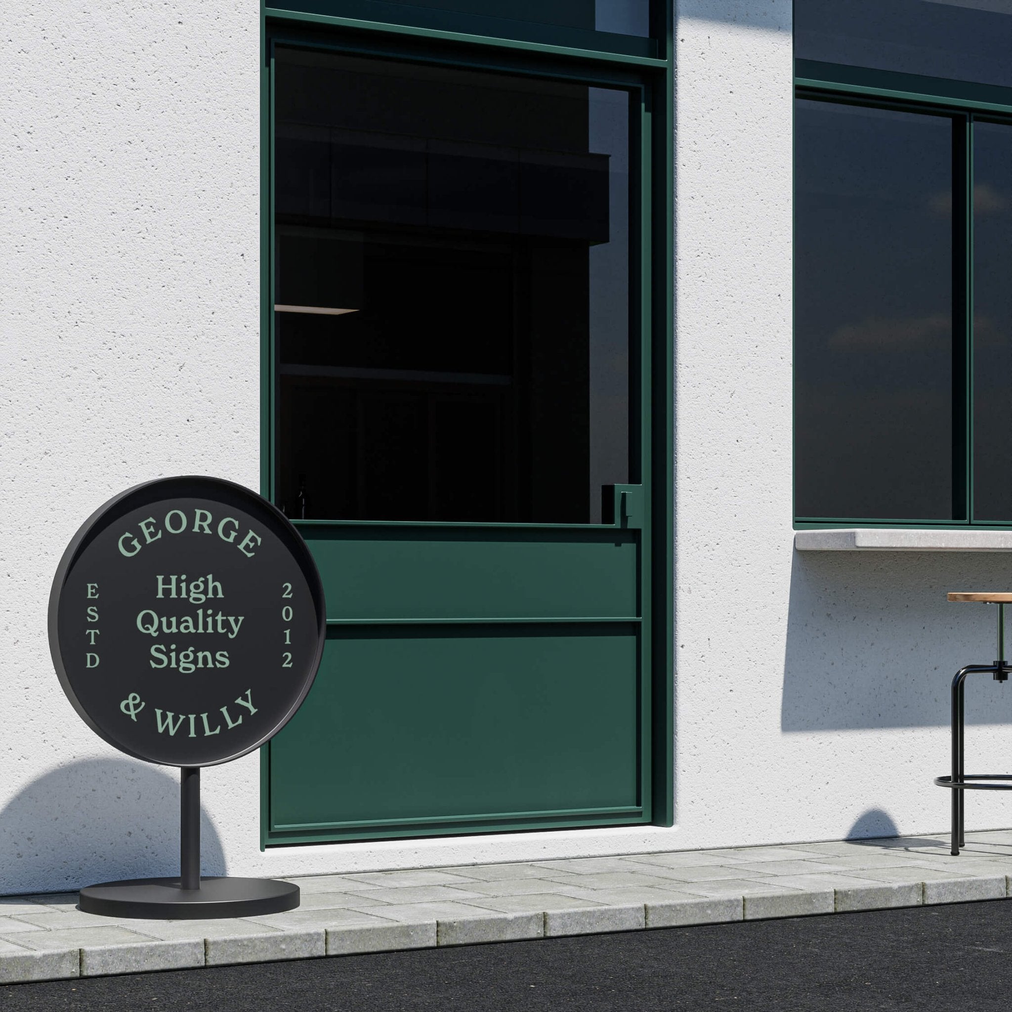 black circle sidewalk business sign as a welcome sign outside the shopfront